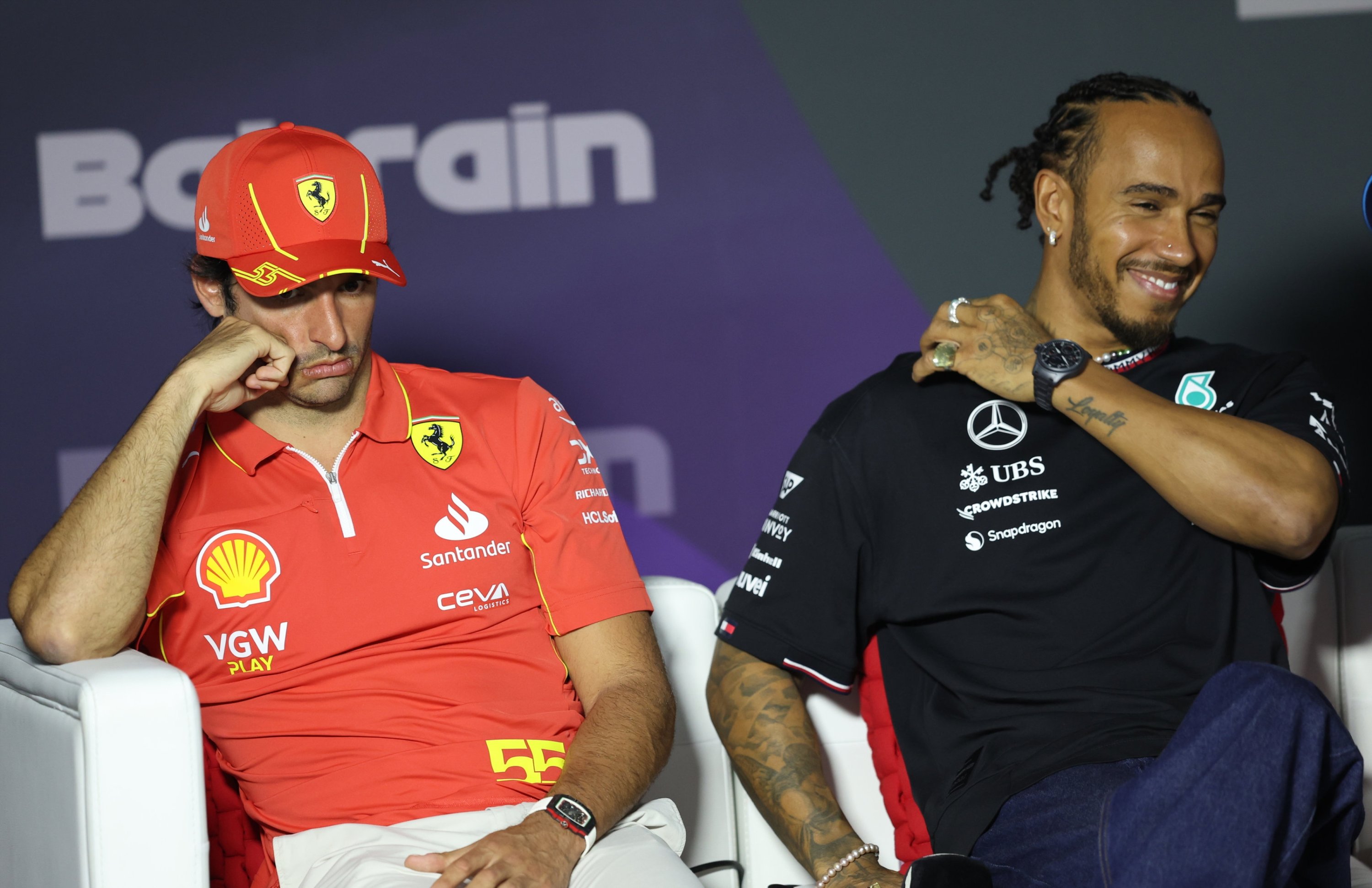 Spanish driver Carlos Sainz (L) of Scuderia Ferrari and British driver Lewis Hamilton of Mercedes-AMG Petronas attend a news conference for the Formula One Bahrain Grand Prix, Sakhir, Bahrain, Feb. 28, 2024. (EPA Photo)