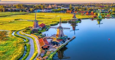 Zaanse Schans windmills in Zaandam near Amsterdam, North Holland, Netherlands. (Shutterstock Photo)