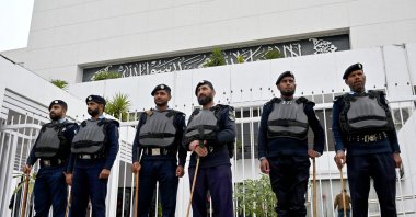 Security personnel stand guard before the start of the inaugural session of the National Assembly, Islamabad, Pakistan, Feb. 29, 2024. (AFP Photo)
