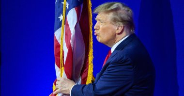 Former U.S. president and 2024 presidential hopeful Donald Trump kisses the U.S. at the annual Conservative Political Action Conference (CPAC), National Harbor, Maryland, U.S., Feb. 24, 2024. (AFP Photo)