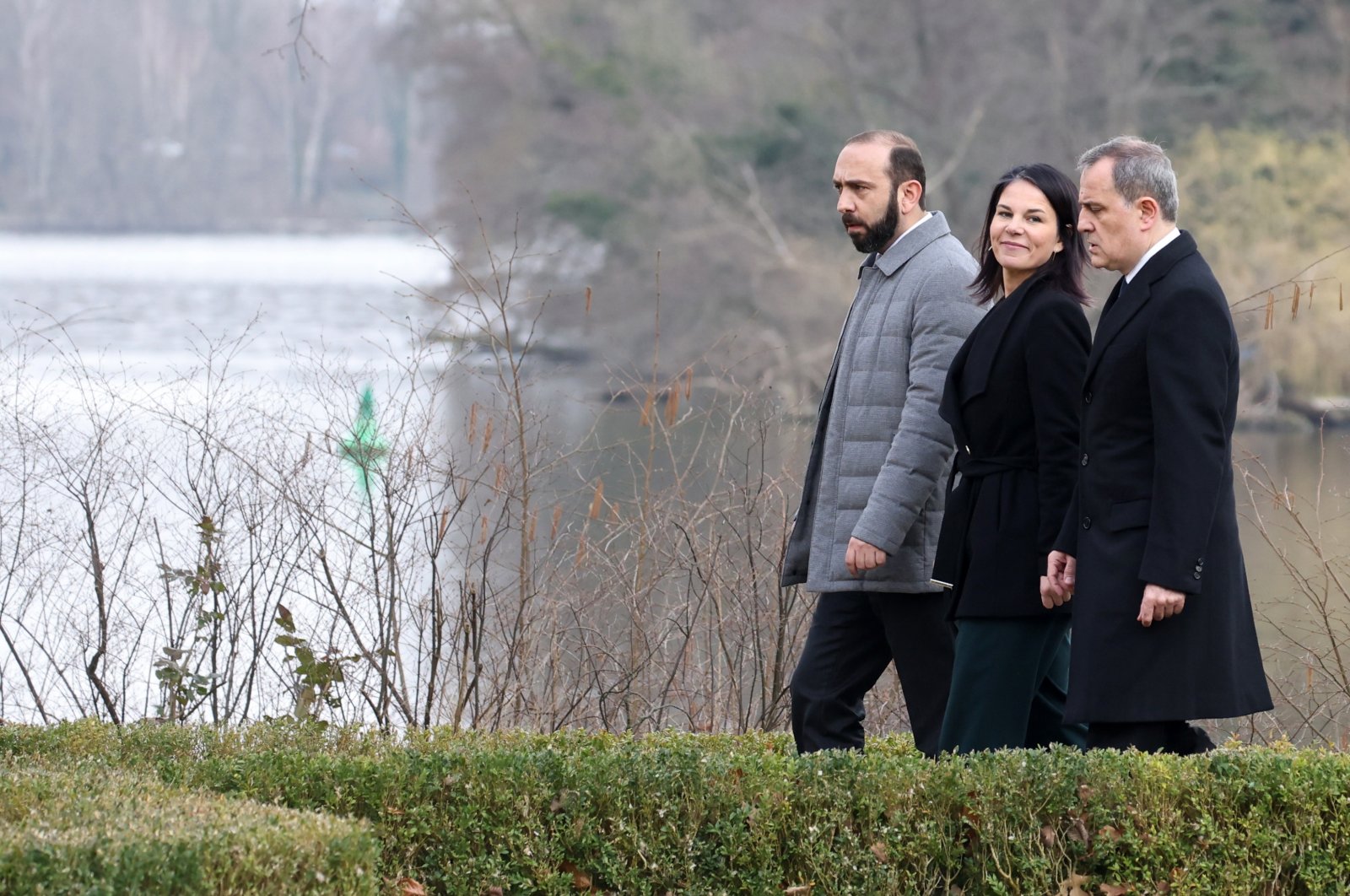 German Foreign Minister Annalena Baerbock (center), Armenian Minister of Foreign Affairs Ararat Mirzoyan (Left) and Azerbaijan&#039;s Foreign Minister Jeyhun Bayramov (Right) walk next to each other in front of the media during a meeting on the occasion of peace talks between Armenia and Azerbaijan at the Villa Borsig venue of the Foreign Ministry in Berlin, Germany, Feb. 28, 2024. (EPA Photo)