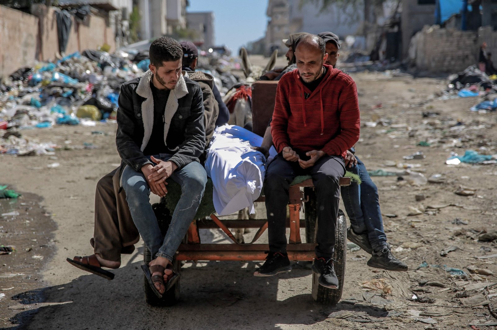 The body of a Palestinian killed in an early morning incident when Israeli forces opened fire on crowds waiting at an aid distribution point in Gaza City, Feb. 29, 2024. (AFP Photo)