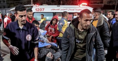 An injured woman is rushed to the emergency ward of the Shuhada al-Aqsa Hospital in al-Zawayda following Israeli bombardment, Gaza Strip, Palestine, March 1, 2024. (AFP Photo)