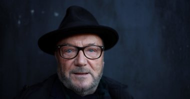 George Galloway, leader of the Workers Party of Britain, poses for a portrait ahead of standing as a candidate in the upcoming Parliamentary by-election, Rochdale, U.K., Feb. 26, 2024. (Reuters Photo)