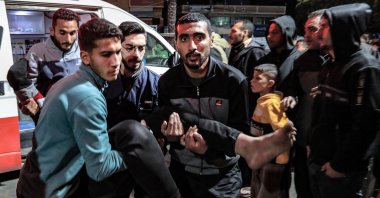 An injured man is rushed to the emergency ward of Shuhada Al-Aqsa Hospital after an Israeli bombardment, Gaza Strip, Palestine, March 1, 2024. (AFP Photo)