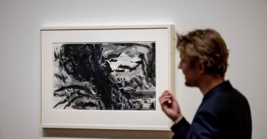 A man walks past an untitled painting by Chinese Canadian artist Matthew Wong during an exhibition in the Van Gogh Museum in Amsterdam, Netherlands, Feb. 28, 2024. (AFP Photo)