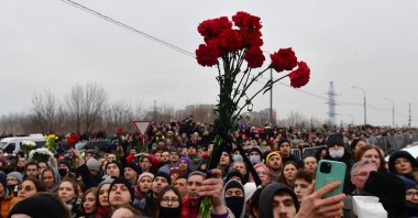 Mourners attend a funeral ceremony for late Russian opposition leader Alexei Navalny at the Borisovo cemetery in Moscow's district of Maryino, March 1, 2024. (AFP Photo)