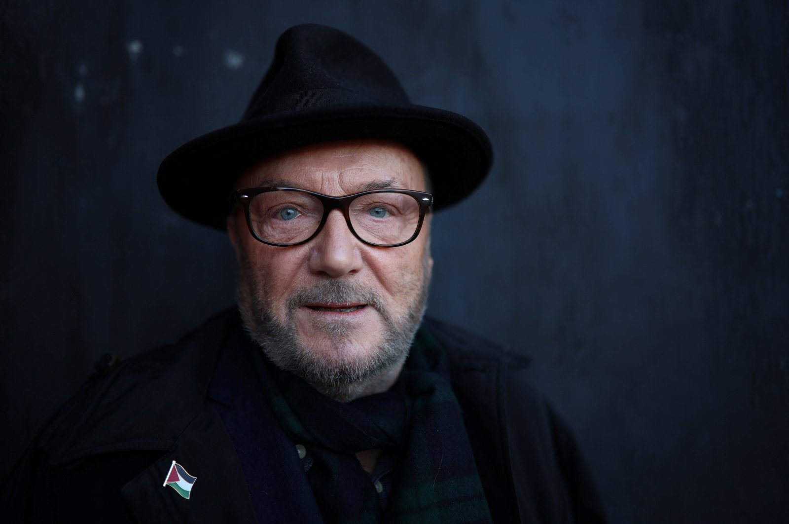 George Galloway, leader of the Workers Party of Britain, poses for a portrait ahead of standing as a candidate in the upcoming Parliamentary by-election, Rochdale, U.K., Feb. 26, 2024. (Reuters Photo)