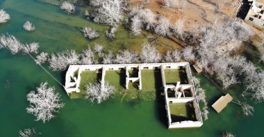 The Tekkale village castle, believed to date back to the Middle Ages, resurfaced after water was released from Yusufeli dam, Artvin, Türkiye, March 03, 2024. (AA Photo)