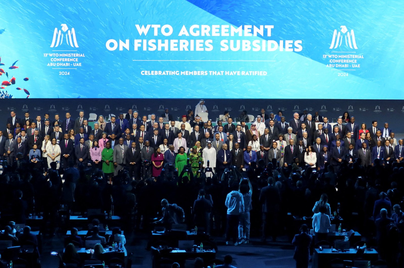 Delegates pose for a family photo during the 13th WTO ministerial conference in Abu Dhabi, UAE, Feb. 26, 2024. (Reuters Photo)