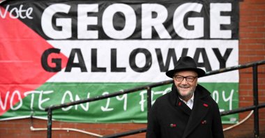 George Galloway, the new Workers Party MP for Rochdale, poses for a photograph outside his campaign headquarters, Rochdale, northern England, March 1, 2024. (AFP Photo)