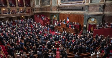French members of the Parliament stand and applaud after approving a bill to enshrine women's right to abortion in the constitution, during a special congress gathering of both houses of parliament (National Assembly and Senate) in the Palace of Versailles, outside Paris, France, March 4, 2024. (EPA Photo)