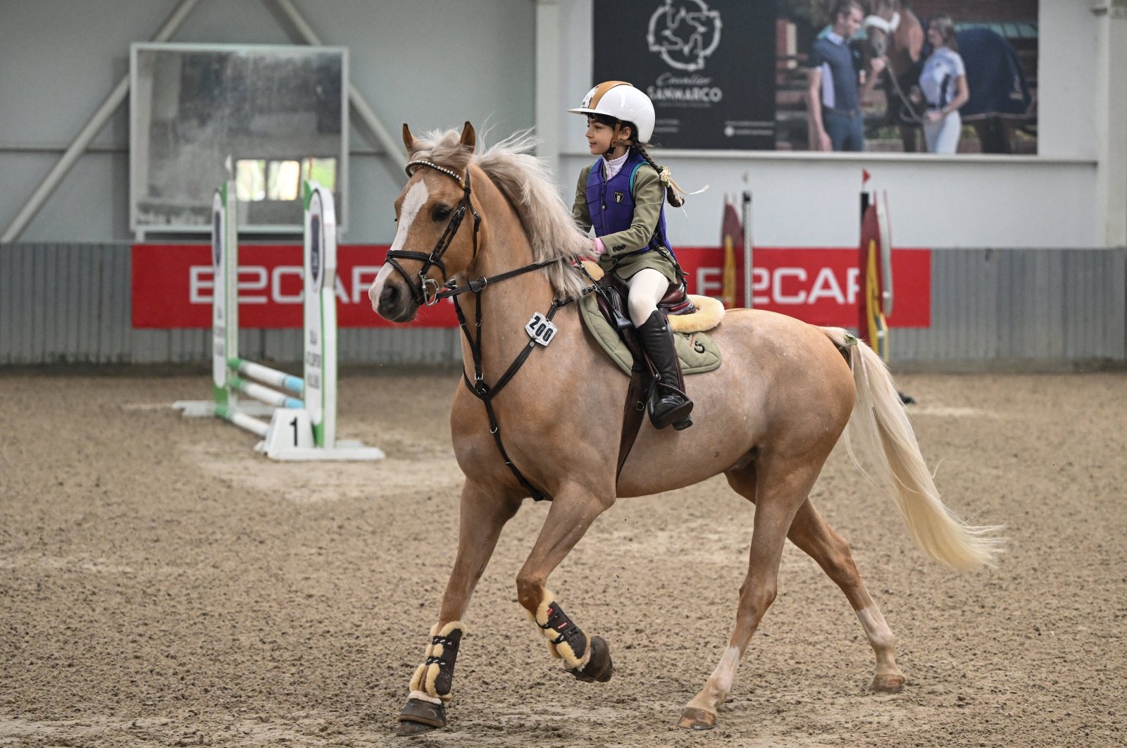 A young Turkish equestrian participates in the launch of the Eyüp Sabri Tuncer 2024 Pony League at the Dila Atlı Sports Club, Istanbul, Türkiye, March 2, 2024. (AA Photo)