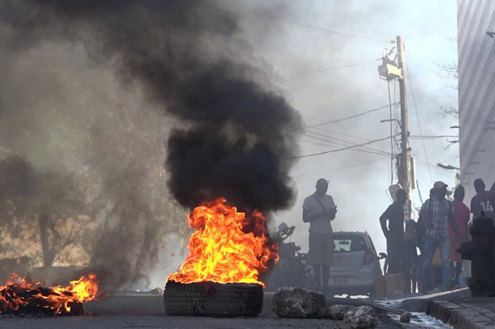 Tires on fire near the main prison of Port-au-Prince, Haiti, March 3, 2024. (AFP Photo)