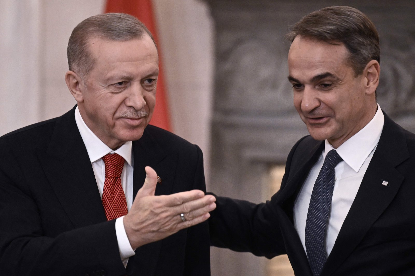 President Recep Tayyip Erdoğan (L) and Greek Prime Minister Kyriakos Mitsotakis leave after speaking to the press following their meeting during Erdoğan&#039;s official visit to Greece, Athens, Dec. 7, 2023. (AFP Photo)