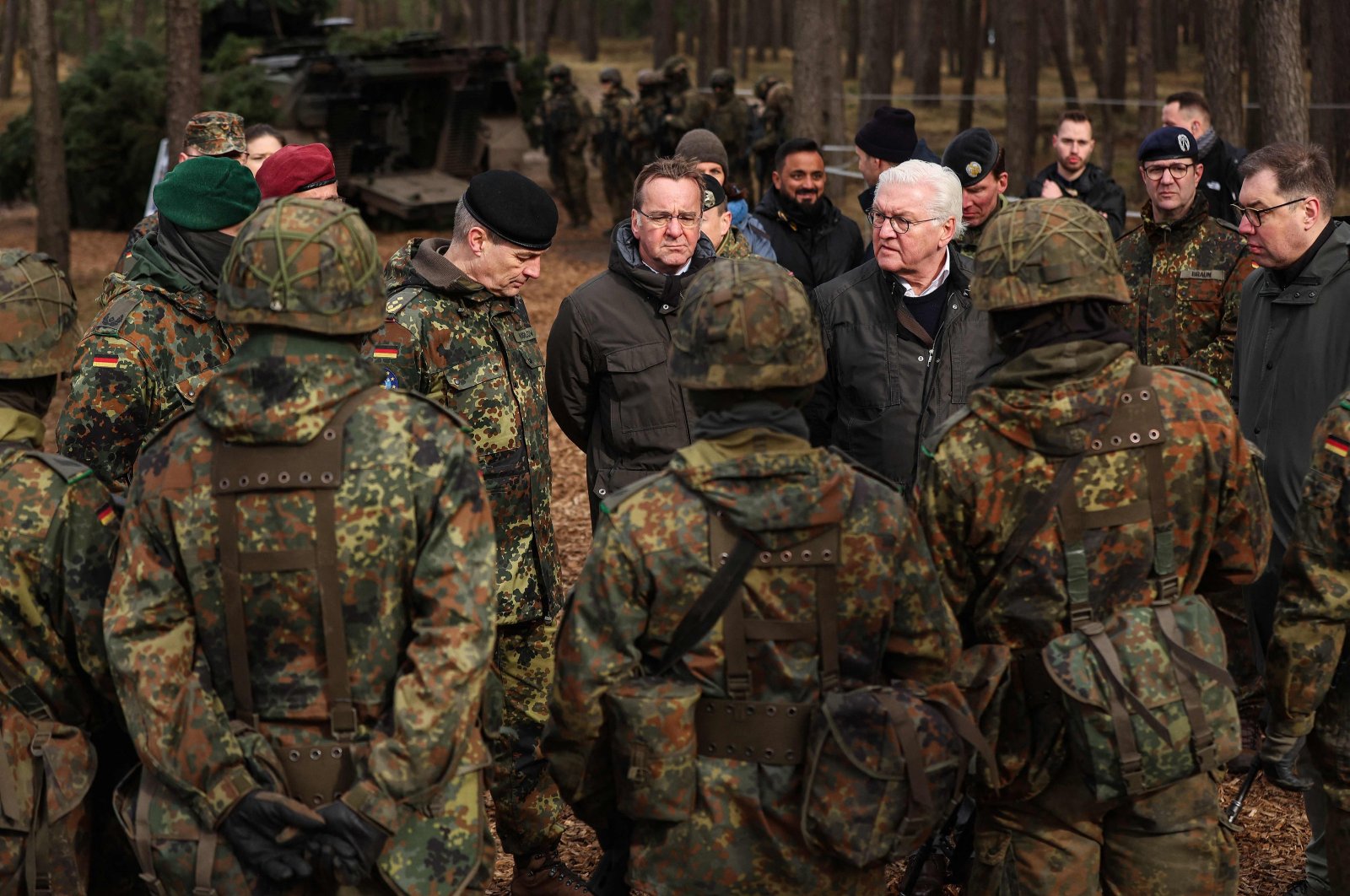 German officials and Ukraine&#039;s Ambassador to Germany Oleksii Makeiev react during a visit of Ukrainian troops at the Klietz military training area in Klietz, eastern Germany, Feb. 23, 2024. (AFP Photo)