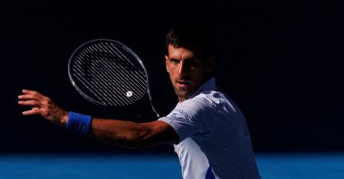 Serbia&#039;s Novak Djokovic in action against Italy&#039;s Jannik Sinner in the semifinals of the men&#039;s singles at the Australian Open, Melbourne, Australia, Jan 26, 2024. (Reuters Photo)