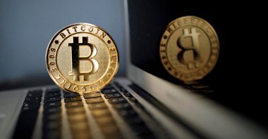 A bitcoin is seen in an illustration picture taken at La Maison du Bitcoin in Paris, France, June 23, 2017. (Reuters Photo)