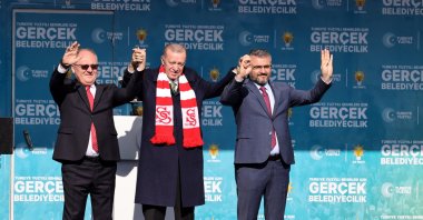 President Recep Tayyip Erdoğan (C) greets the crowd with Sivas Mayor Hilmi Bilgin (L) and AK Party Sivas Chair Yusuf Tanrıverdi (R), Sivas, central Türkiye, March 5, 2024. (AA Photo)
