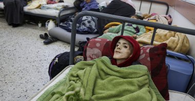 Ten-year-old Palestinian boy, Yazan al-Kafarneh, lies on a hospital bed at Al-Awda clinic in Rafah, southern Gaza Strip, Palestine, Feb. 29, 2024. (AFP Photo)