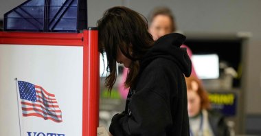 A woman cast her vote at a polling station in Provo, Utah, on March 5, 2024, during the Super Tuesday primary on March 5, 2024. (AFP Photo)