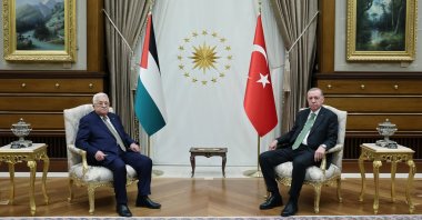 President Recep Tayyip Erdoğan and Palestinian President Mahmoud Abbas are seated as they pose for the media before their meeting in Ankara, Turkey, March 5, 2024. (Presidential Press Service Handout via EPA)