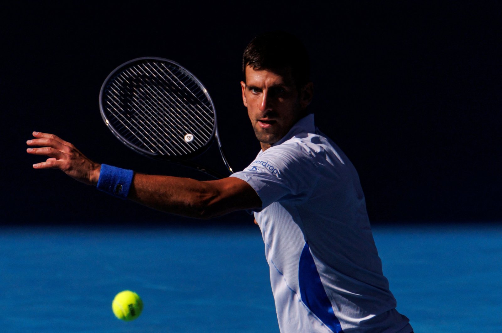 Serbia&#039;s Novak Djokovic in action against Italy&#039;s Jannik Sinner in the semifinals of the men&#039;s singles at the Australian Open, Melbourne, Australia, Jan 26, 2024. (Reuters Photo)
