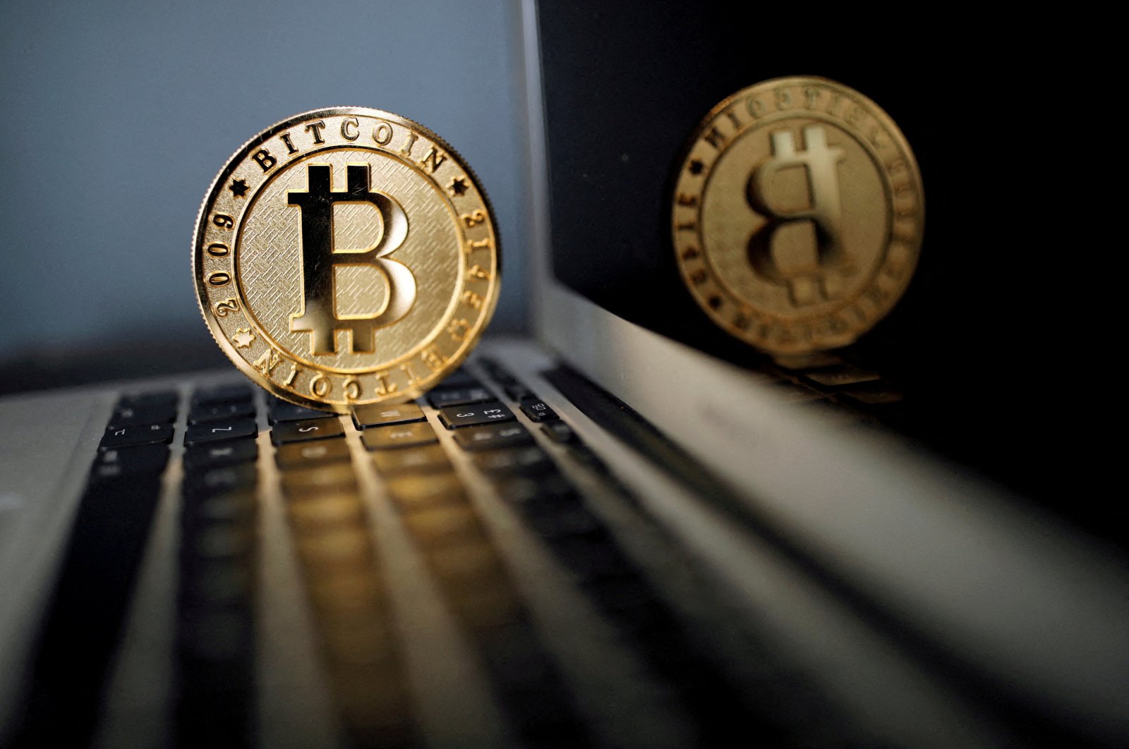 A bitcoin is seen in an illustration picture taken at La Maison du Bitcoin in Paris, France, June 23, 2017. (Reuters Photo)