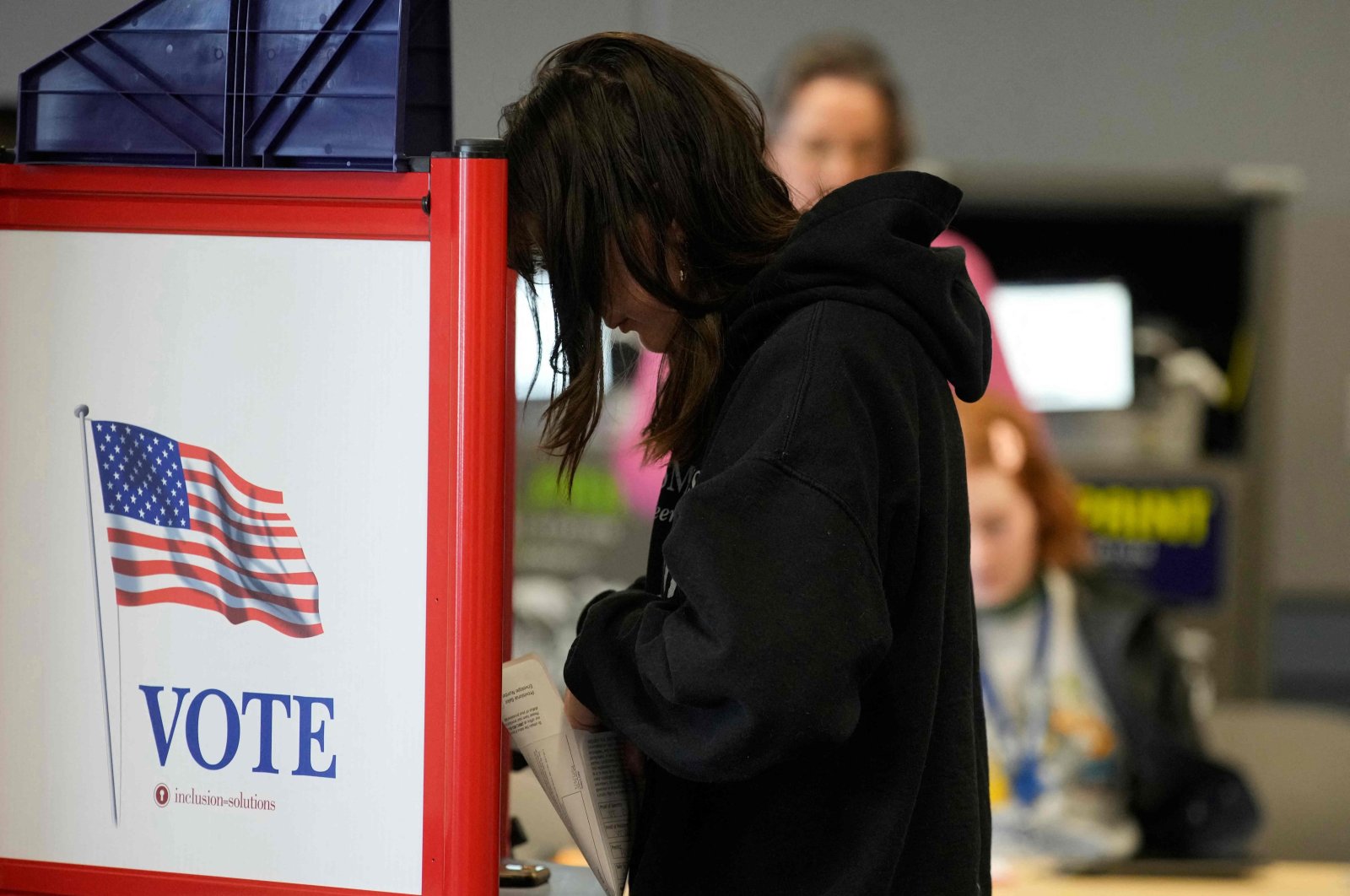 A woman cast her vote at a polling station in Provo, Utah, on March 5, 2024, during the Super Tuesday primary on March 5, 2024. (AFP Photo)