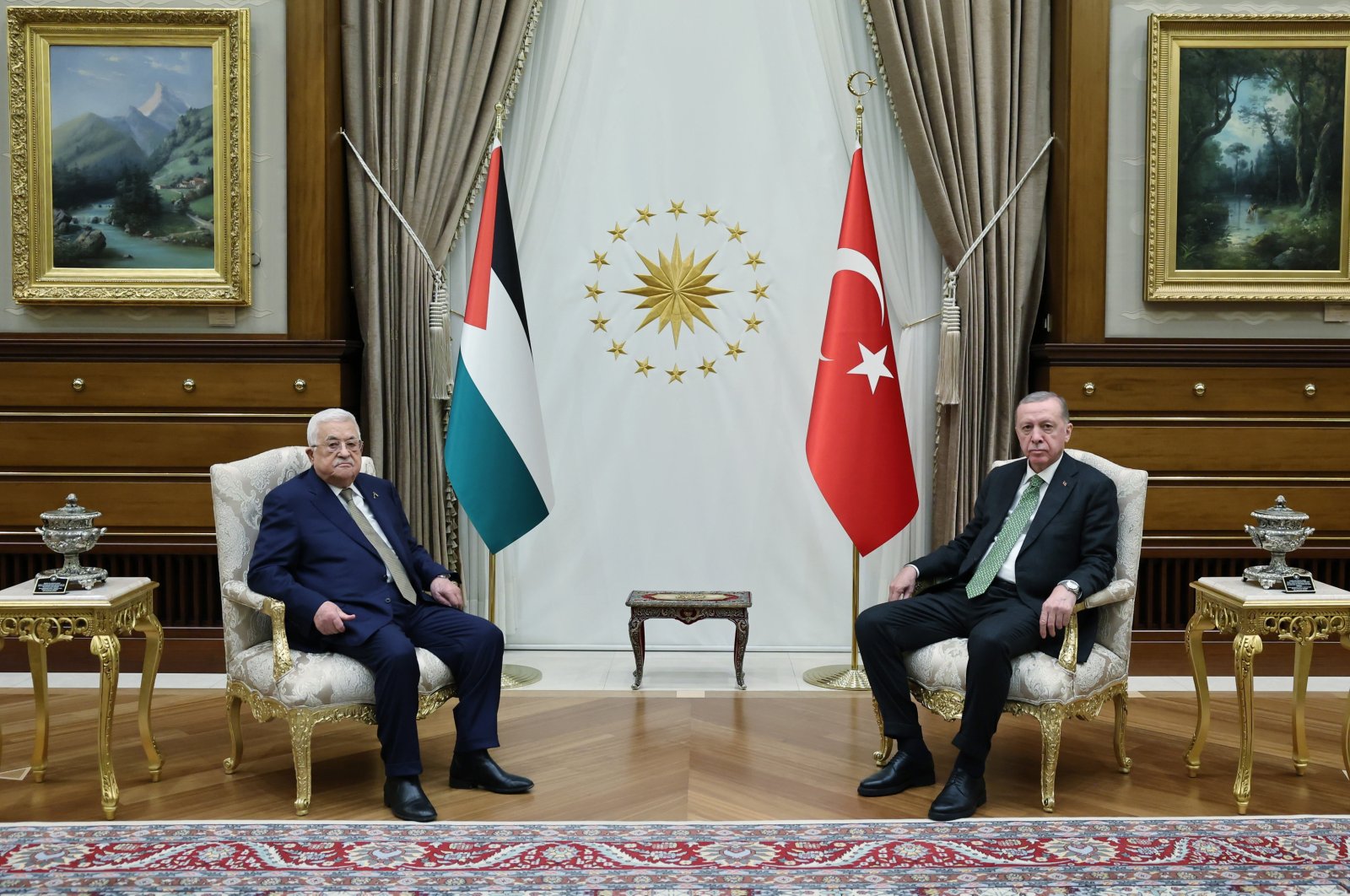 President Recep Tayyip Erdoğan and Palestinian President Mahmoud Abbas are seated as they pose for the media before their meeting in Ankara, Turkey, March 5, 2024. (Presidential Press Service Handout via EPA)