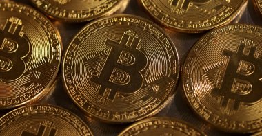 Representations of the Bitcoin cryptocurrency are seen in this illustration, Aug. 10, 2022. (Reuters Photo)