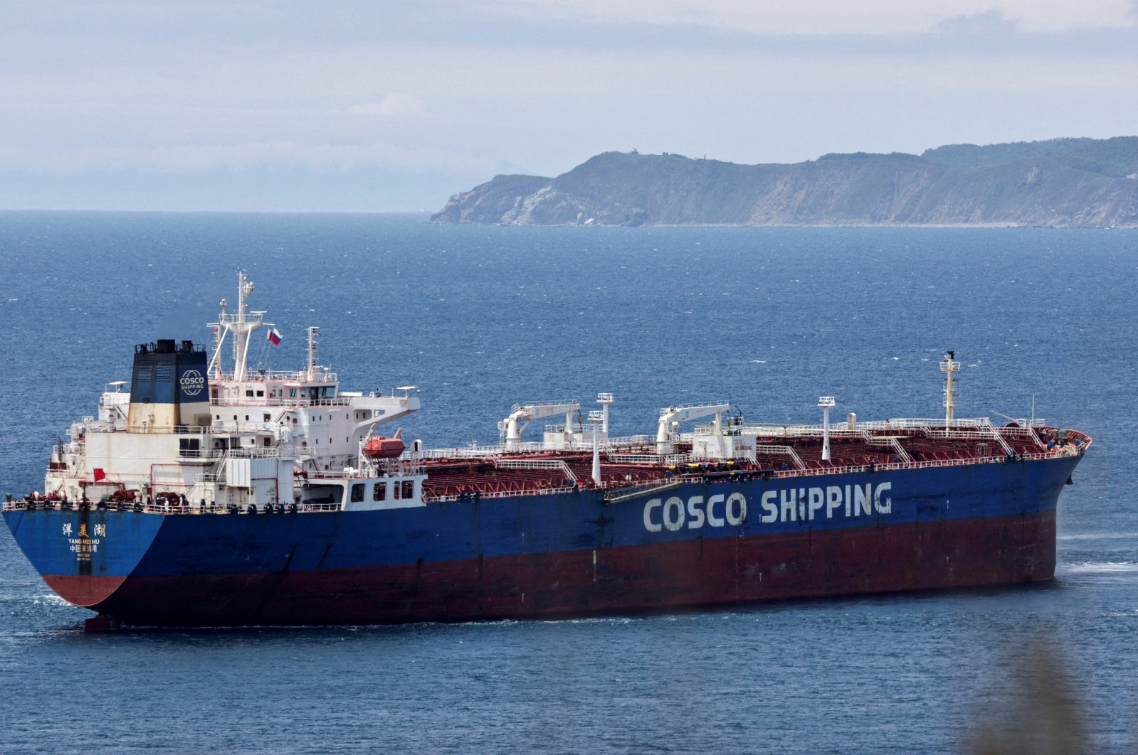 Yang Mei Hu oil products tanker owned by COSCO Shipping gets moored at the crude oil terminal Kozmino on the shore of Nakhodka Bay near the port city of Nakhodka, Russia, June 13, 2022. (Reuters Photo)
