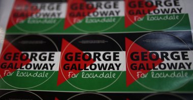 Stickers encouraging people to vote for candidate George Galloway, leader of the Workers Party of Britain, are seen in his campaign office ahead of the upcoming Parliamentary by-election in Rochdale, Britain, Feb. 26, 2024. (Reuters Photo)