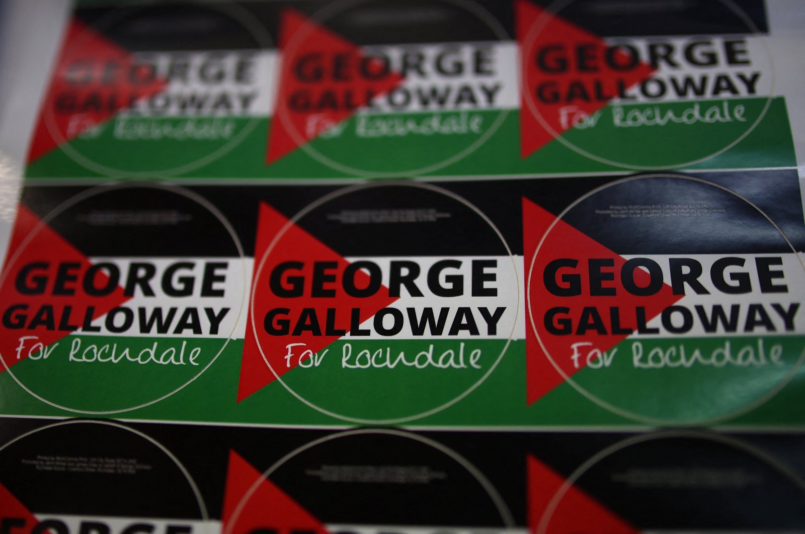 Stickers encouraging people to vote for candidate George Galloway, leader of the Workers Party of Britain, are seen in his campaign office ahead of the upcoming Parliamentary by-election in Rochdale, Britain, Feb. 26, 2024. (Reuters Photo)