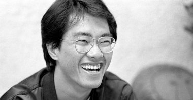This black and white photo taken in May 1982 shows Japanese manga artist Akira Toriyama, whose death was announced on March 8, 2024. The creator of Japan&#039;s hugely popular and influential &quot;Dragon Ball&quot; comics and anime cartoons, Akira Toriyama, has died aged 68, his production team said on March 8, 2024. (AFP Photo)