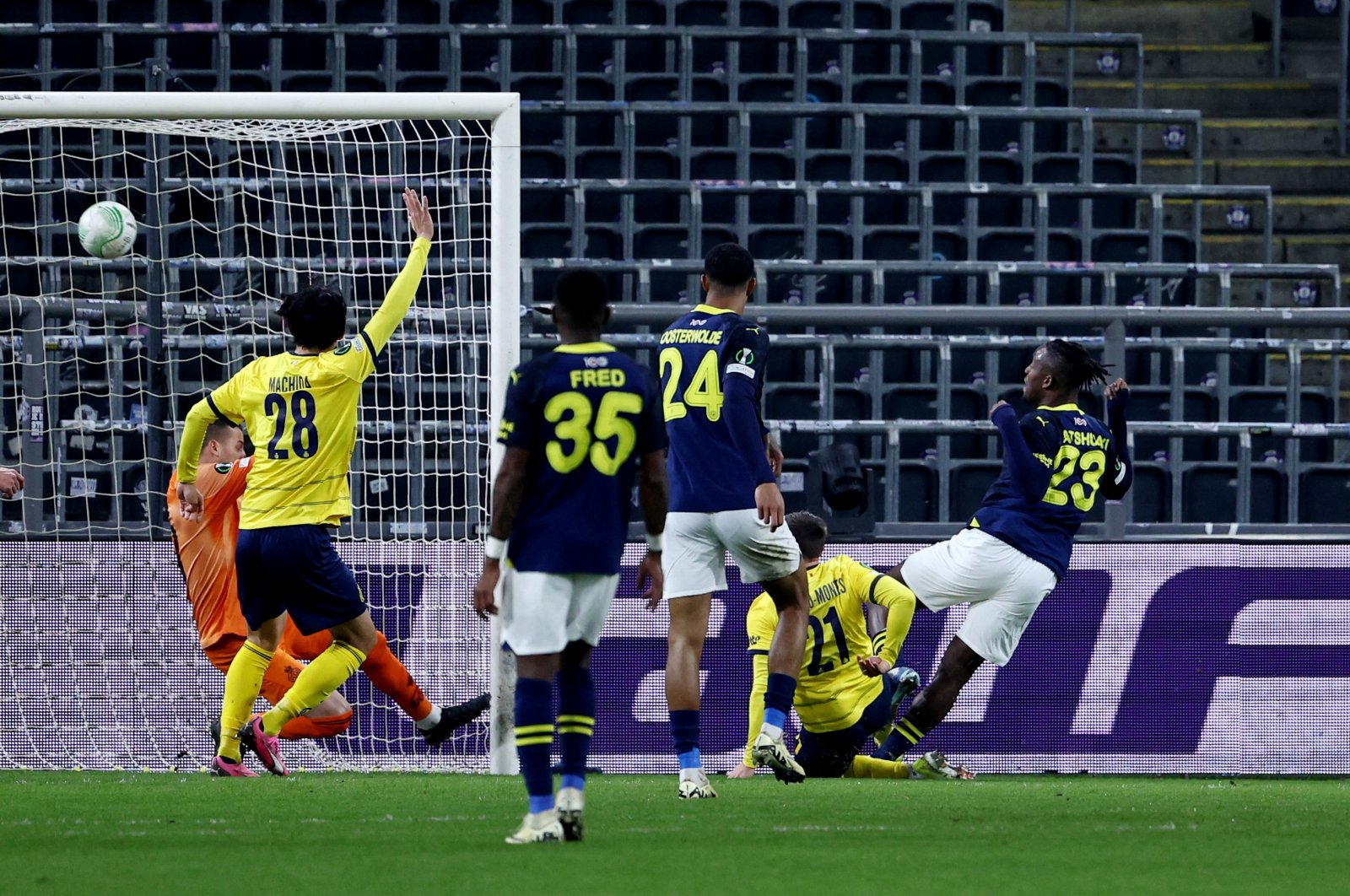 Fenerbahçe&#039;s Michy Batshuayi (R) scores their first goal during the Europa Conference League Round of 16 first leg match against Union Saint-Gilloise, Lotto Park, Anderlecht, Belgium, March 7, 2024. (Reuters Photo)