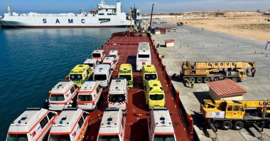 Ambulances donated by Hayrat Humanitarian Assistance Foundation are loaded on vessels in Mersin to be sent to Gaza, Feb. 27, 2024. (AA Photo)
