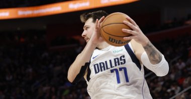 Dallas Mavericks guard Luka Doncic grabs a rebound in an NBA game against the Detroit Pistons, Detroit, Michigan, U.S., Mar 9, 2024. (Reuters Photo)