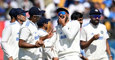 India&#039;s players celebrate the dismissal of England&#039;s Mark Wood during Day 3 of fifth Test in Dharamsala, India, March 9, 2024. (AFP Photo)