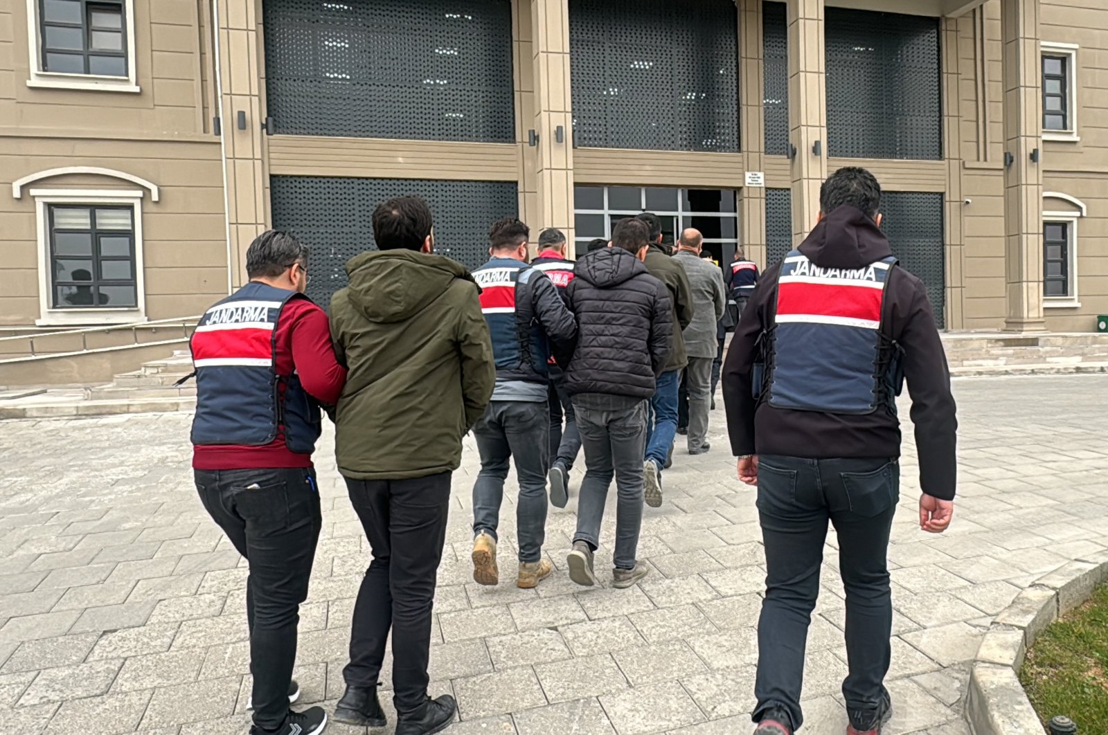 Gendarmerie forces escort to the courthouse 17 PKK suspects detained in southern Şanlıurfa province, Türkiye, March 6, 2024. (AA Photo)