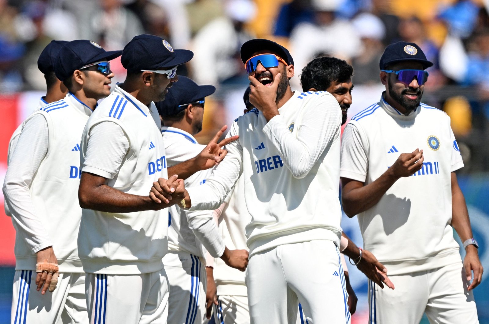 India&#039;s players celebrate the dismissal of England&#039;s Mark Wood during Day 3 of fifth Test in Dharamsala, India, March 9, 2024. (AFP Photo)