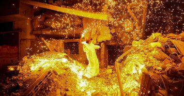 A Palestinian child plays with a sparkler in Rafah, in the southern Gaza Strip, Palestine, March 10, 2024. (AFP Photo)