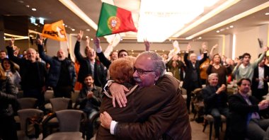 Democratic Alliance (AD) supporters react to information showed by an exit poll, at the party&#039;s electoral night headquarters, in Lisbon, Portugal, March 10, 2024. (AFP Photo)