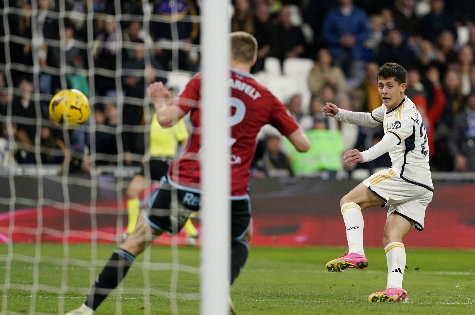 Real Madrid&#039;s Arda Güler (R) scores their fourth goal during the La Liga match against Celta Vigo at the Santiago Bernabeu, Madrid, Spain, March 10, 2024. (Reuters Photo) 