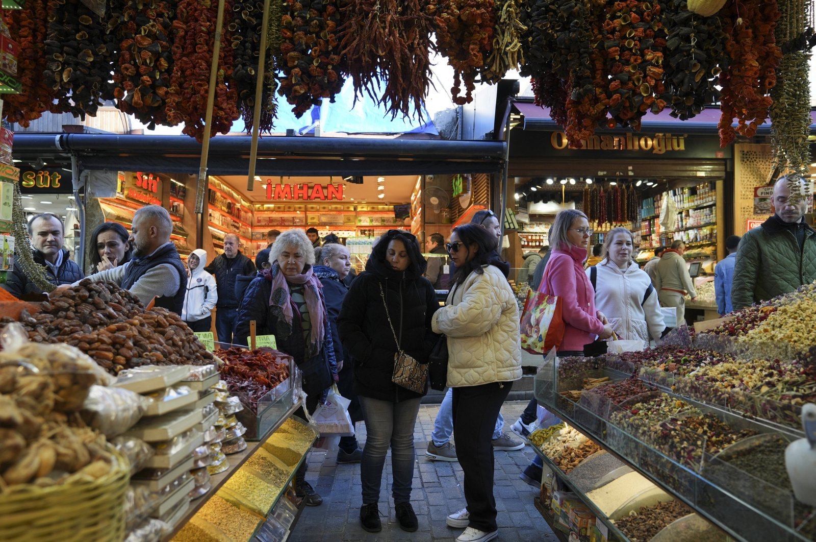 People browse foodstuff at shops near the iconic Grand Bazaar, Istanbul, Türkiye, March 10, 2024. (AA Photo)