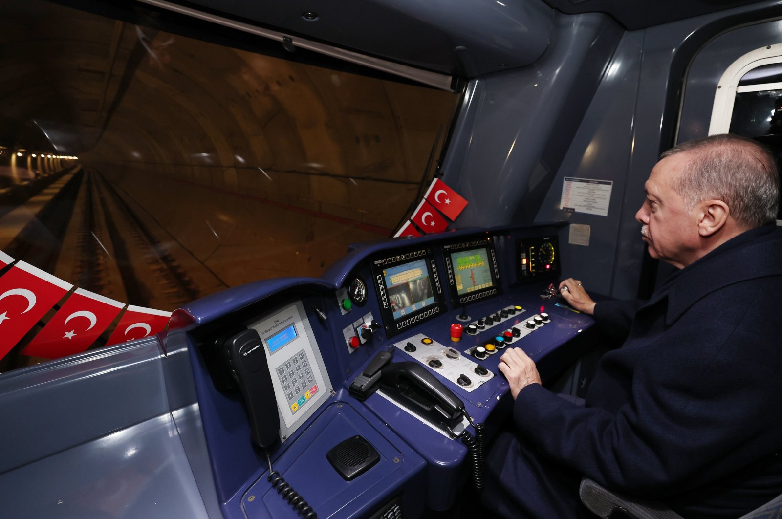 President Recep Tayyip Erdoğan helms a metro train he inaugurated in Istanbul, Türkiye, March 10, 2024. (AA Photo)