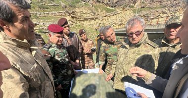 Gen. Metin Tokel (2nd R) talks to Iraqi officials in an undisclosed location in Iraq, March 12, 2024. (AA Photo)