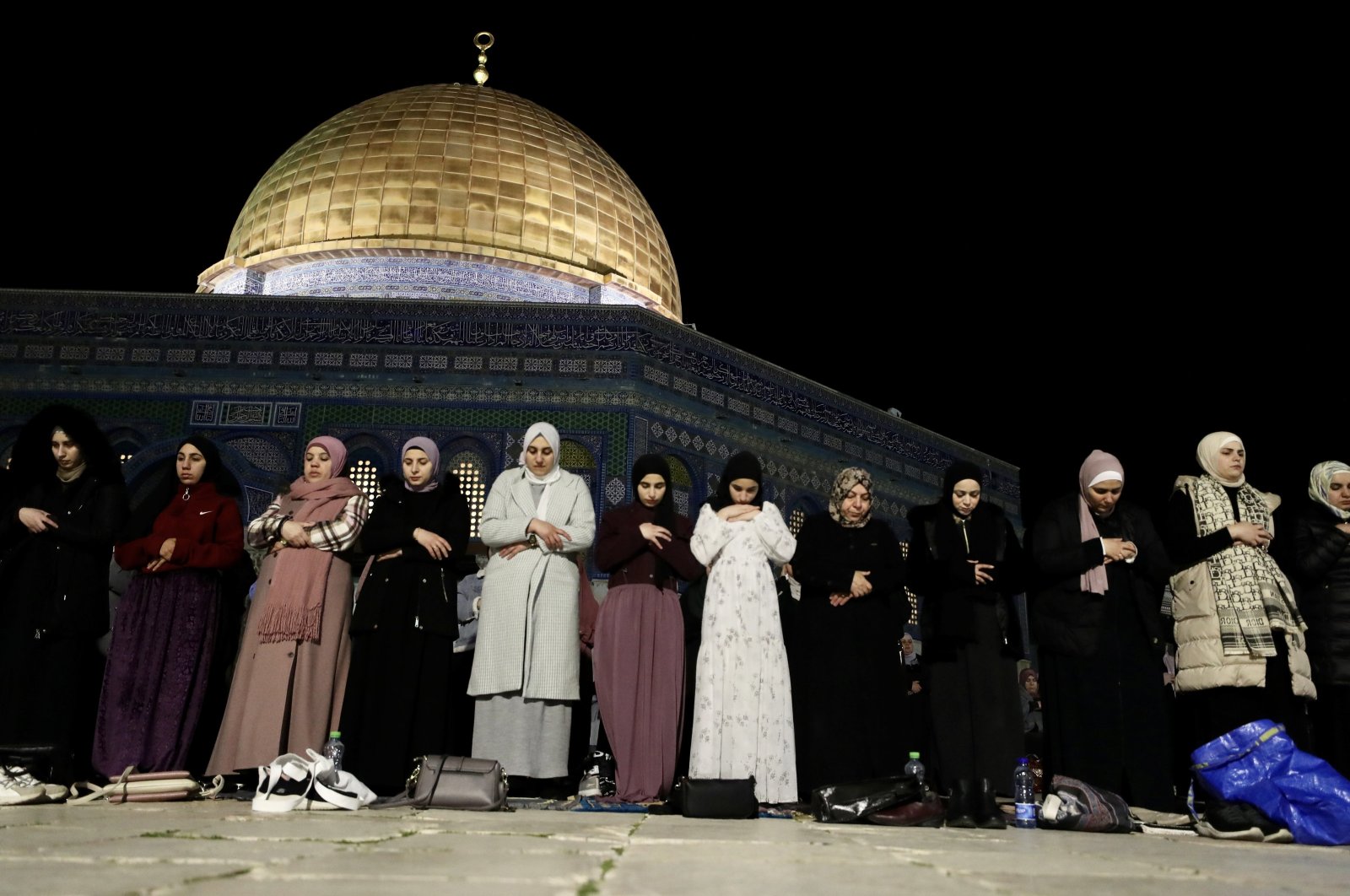 Palestinians attend Tarawih prayer at the Al-Aqsa Mosque compound on the first day of the holy fasting month of Ramadan, occupied East Jerusalem, Palestine, March 11, 2024. (EPA Photo)