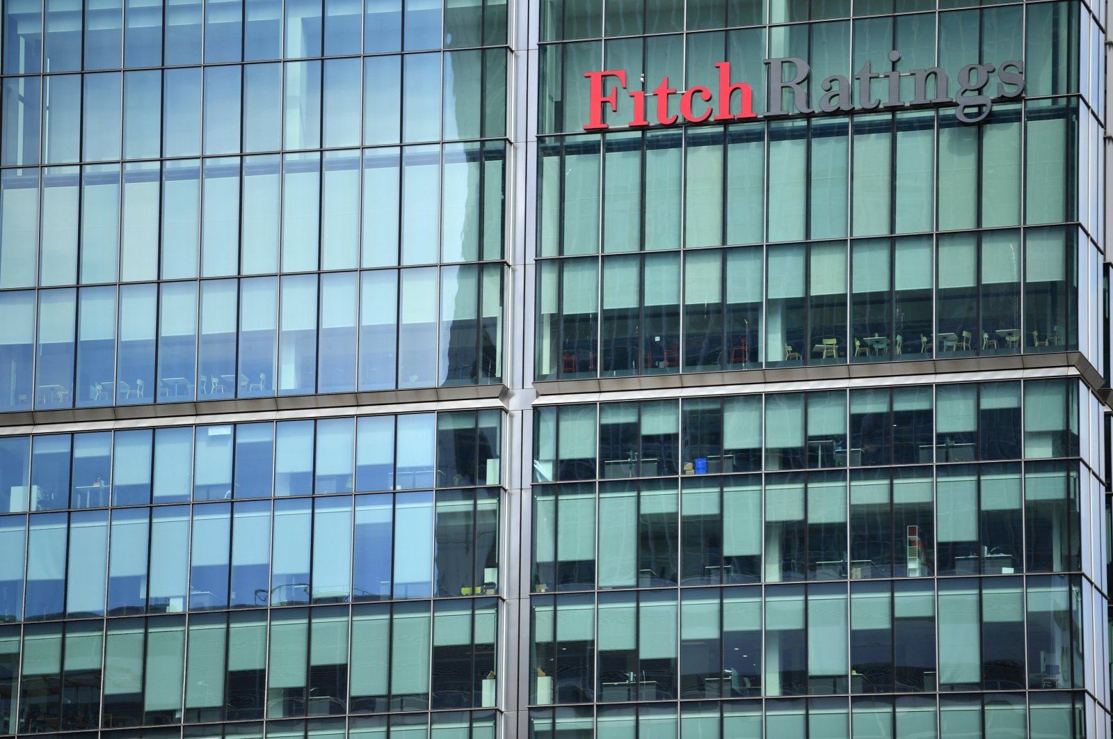 The offices of the Fitch Ratings building are seen in Canary Wharf, London, U.K., May 27, 2020. (Reuters Photo)