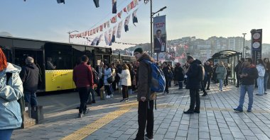 People wait for buses after the metro line stops due to a glitch, Istanbul, Türkiye, March 7, 2024. (AA Photo)